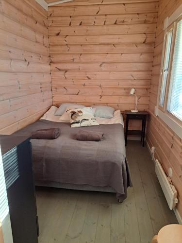 מיטה או מיטות בחדר ב-Norrby Gård - Villa Gråberg