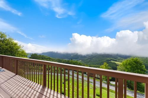 a balcony with a view of the mountains at Golden Ridge Getaway in Blowing Rock