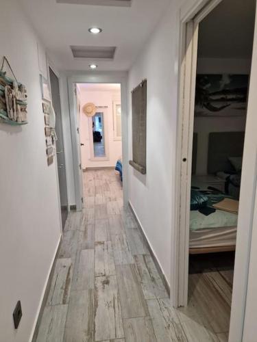 Ένα ή περισσότερα κρεβάτια σε δωμάτιο στο Cullera Confort Playa