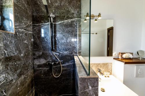 a bathroom with a shower and a sink at Bella Vista in Venus