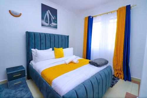 Postel nebo postele na pokoji v ubytování One bedroom near garden city