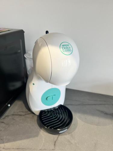a hair dryer sitting on top of a counter at Luxury Retreat Beach House - Sleeps 6 in Southend-on-Sea