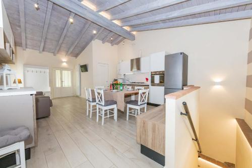 Η κουζίνα ή μικρή κουζίνα στο Bertoletta Village Apartments