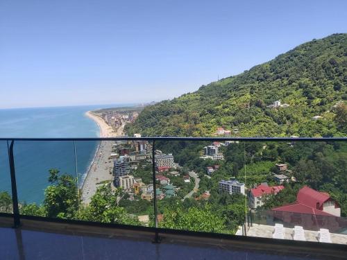 a view of a beach and the ocean at Goga Guest House in Kvariati
