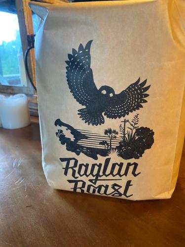 a bag with a bird on it on a table at The Narrows Landing Hotel in Hamilton