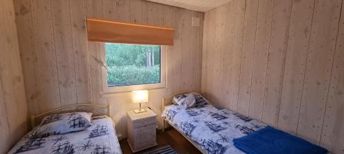 Katil atau katil-katil dalam bilik di Jõesuu Puhkemaja
