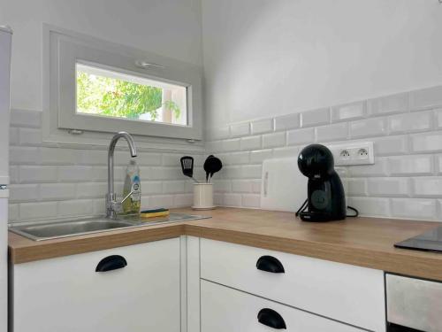 Η κουζίνα ή μικρή κουζίνα στο Cozy & Elegant Appartement Narbonne