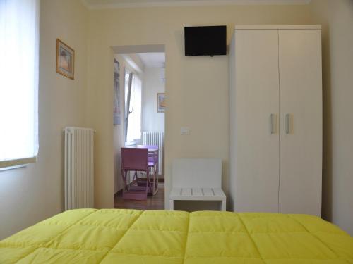 Letto o letti in una camera di San Guglielmo Apartments