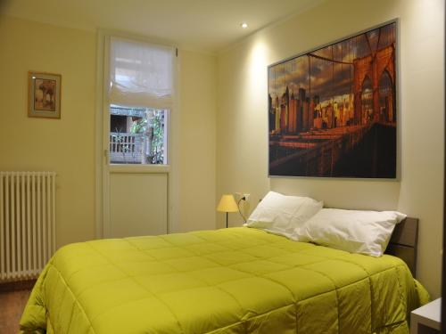 Posteľ alebo postele v izbe v ubytovaní San Guglielmo Apartments