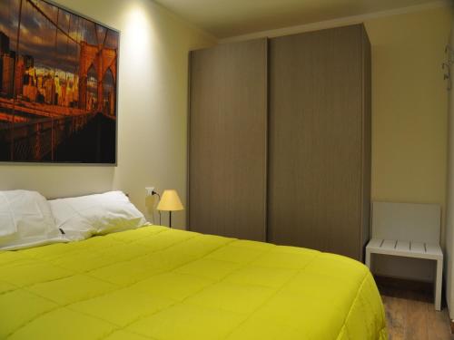 Letto o letti in una camera di San Guglielmo Apartments
