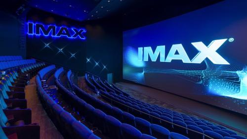 an image of an imax theatre with blue chairs at Shinagawa Prince Hotel East Tower in Tokyo