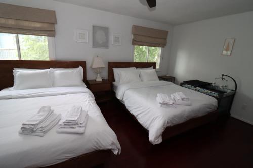 Postel nebo postele na pokoji v ubytování Beach Luxury Townhouse