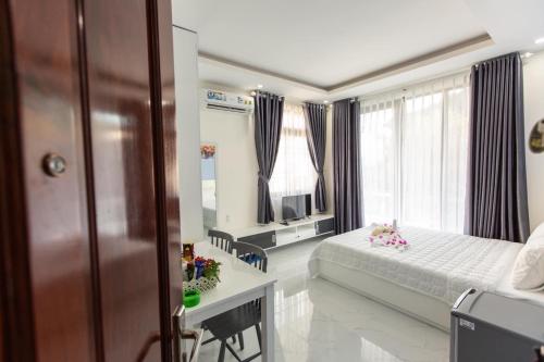 Ένα ή περισσότερα κρεβάτια σε δωμάτιο στο HOTEL & APARTMENT VY VAN