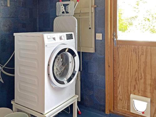 a washer and dryer in a room at 6 person holiday home in UDDEVALLA-By Traum in Uddevalla