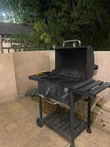 a black grill sitting on top of a table at Hatta Orchard in Hatta