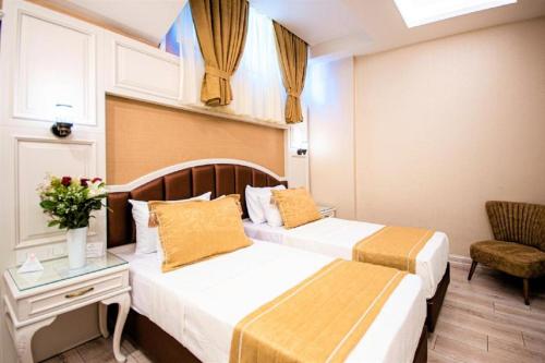 Katil atau katil-katil dalam bilik di Boss Hotel Sultanahmet