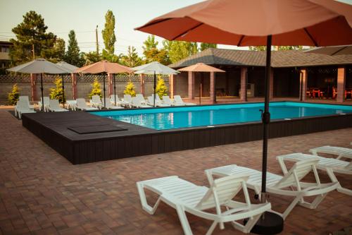 Bazén v ubytování REEF Hotel nebo v jeho okolí
