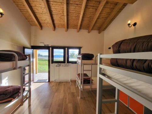 Postel nebo postele na pokoji v ubytování Albergue Los Hospitales