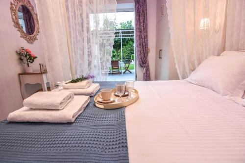 Ένα ή περισσότερα κρεβάτια σε δωμάτιο στο Dream Luxury Home
