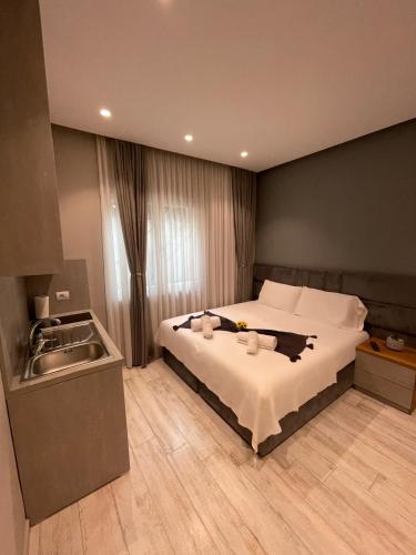 Кровать или кровати в номере Alb Apartments