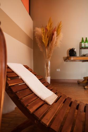a wooden bench with a napkin on top of it at Grand Hotel Telese in Telese