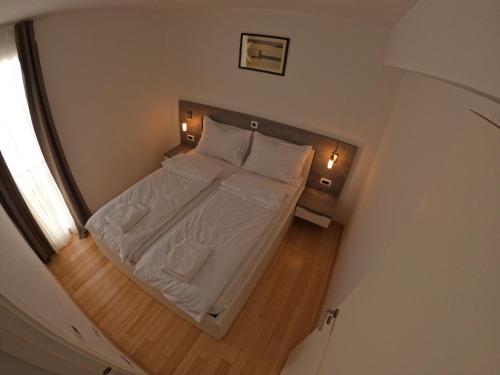 Postel nebo postele na pokoji v ubytování Apartment for 4