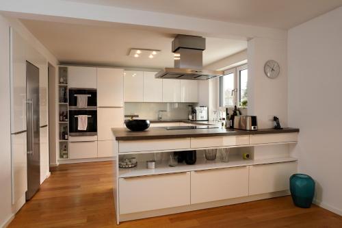Una cocina o cocineta en Design Apartment in Eppelheim