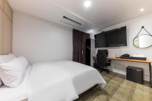 Eumseong Hotel Luemにあるベッド