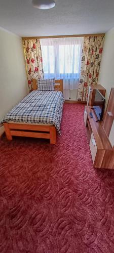 Postel nebo postele na pokoji v ubytování Gemütliches Haus in Gartz/Oder
