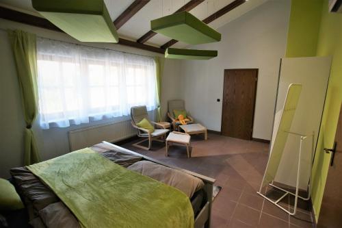 a bedroom with a bed and a living room at Mill Valley Villa in Koblenz
