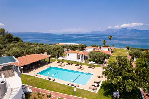 an aerial view of a house with a swimming pool at Blue Marine Village in Chalkida