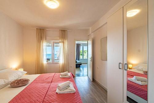 Ένα ή περισσότερα κρεβάτια σε δωμάτιο στο Villa Blue Panorama