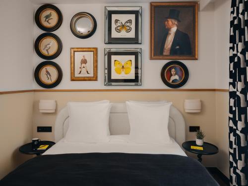 Katil atau katil-katil dalam bilik di Solly Hôtel Paris