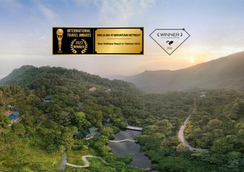 an aerial view of a river in a forest at Melia Ba Vi Mountain Retreat in Hanoi
