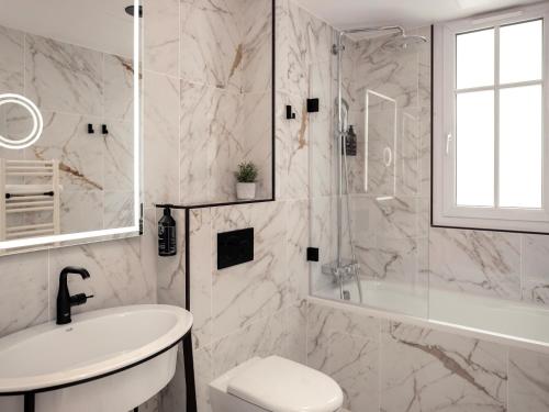 Bilik mandi di Solly Hôtel Paris