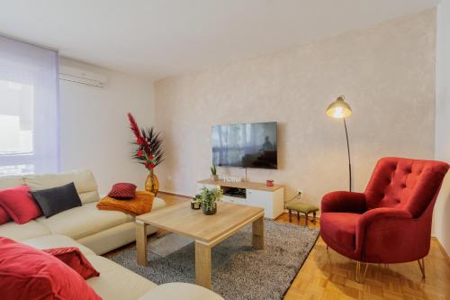 a living room with a couch and two chairs at Center Apartment Silvana in Split