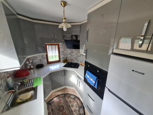an overhead view of a kitchen with a sink at Antik House İznik in İznik