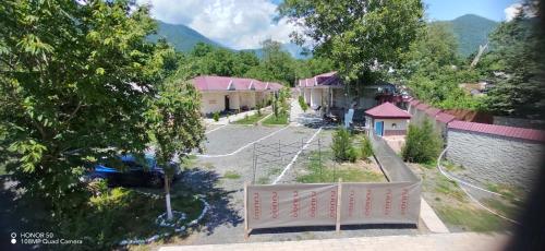 an aerial view of a street in a small village at Hamzalli Garden in Gabala