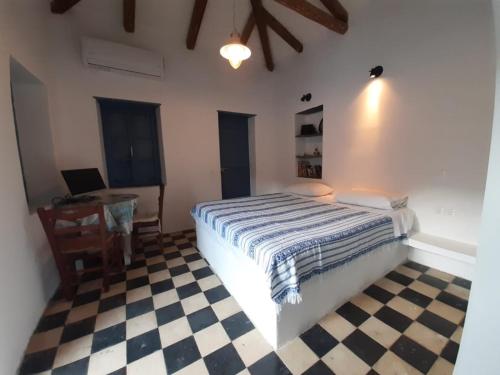 Postel nebo postele na pokoji v ubytování Diamoni Afroditi two houses for max 6 persons