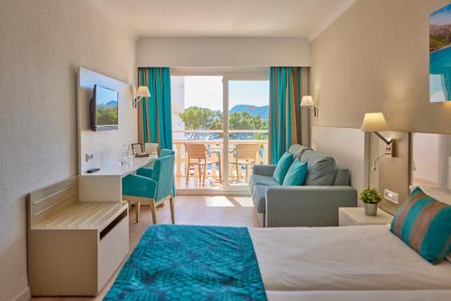 Postel nebo postele na pokoji v ubytování Universal Hotel Lido Park & Spa