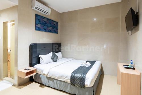 Katil atau katil-katil dalam bilik di New Gentala Hotel RedPartner Medan