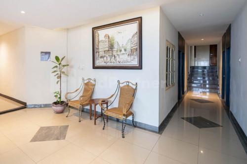 Ruang duduk di New Gentala Hotel RedPartner Medan