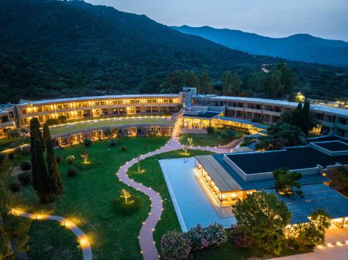 an aerial view of a resort at night at Is Molas Resort in Pula