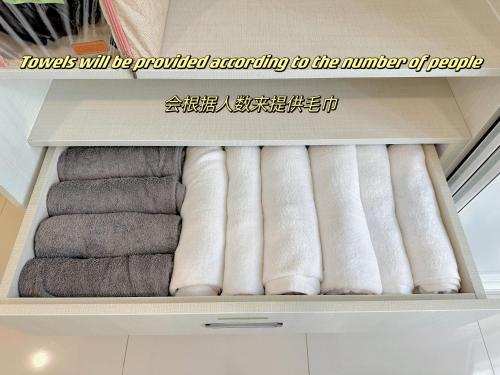 a drawer filled with towels in a room at MyHomeStay@JB LEGOLAND in Nusajaya