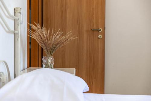 Postel nebo postele na pokoji v ubytování BED BIANCANEVE Villa