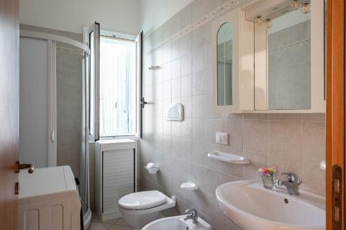 Koupelna v ubytování BED BIANCANEVE Villa