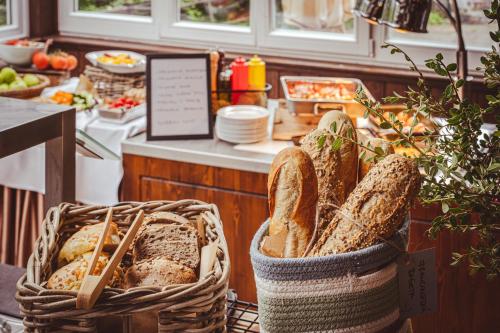 a basket of bread sitting next to a counter at Hotel Sepetná in Ostravice