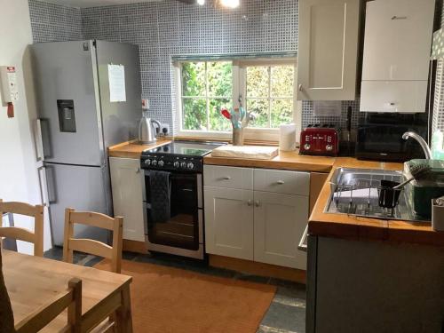 Η κουζίνα ή μικρή κουζίνα στο Apple Tree Corner