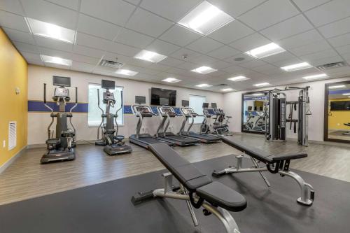 a gym with rows of treadmills and cardio machines at Hampton Inn Camden, SC in Camden
