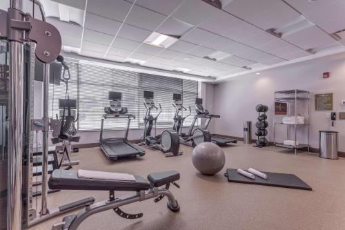 a gym with several treadmills and exercise bikes at Home2 Suites By Hilton Toronto/Brampton, On in Brampton